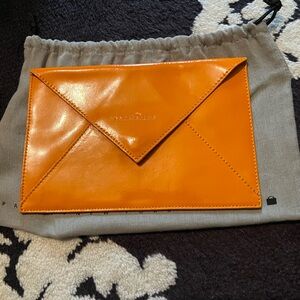 NWOT La Bagagerie Patent Leather Orange Envelope Clutch